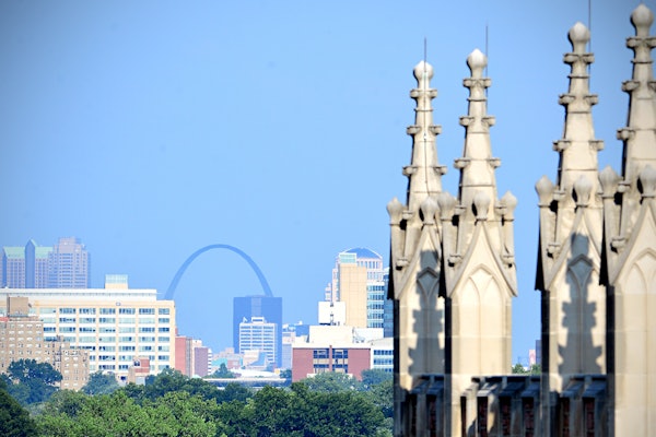A view of the St. Louis skyline over Brown Hall. (Photo: James Byard/Washington University)