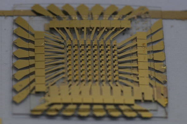 Researchers demonstrated monolithic 3D integration of layered 2D material into novel processing hardware for artificial intelligence computing. The new approach provides a material-level solution for fully integrating many functions into a single, small electronic chip – and paves the way for advanced AI computing. (Image courtesy of Sang-Hoon Bae)