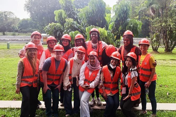 Students from WashU and University of Indonesia Jakarta tour a local wastewater treatment facility.
