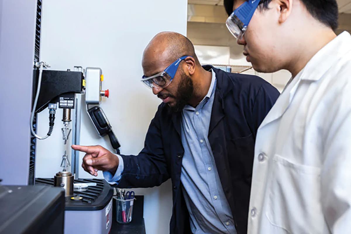 (From left) Marcus Foston, professor of energy, environmental & chemical engineering, with Zhenqin “Jerry” Wang, in Foston's Bioproducts Engineering Lab. (Photo: Jerry Naunheim)