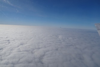 New results from an atmospheric study over the eastern North Atlantic reveal that tiny aerosol particles which seed clouds can form out of next-to-nothingness over the open ocean. This image was taken on the aircraft carrying 55 different atmospheric instrument systems which took measurements over the Azores and surrounding ocean. (Courtesy photo)