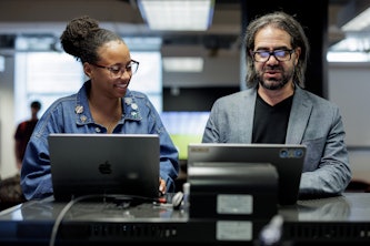 Ian Bogost, the Barbara and David Thomas Distinguished Professor and director of film and media studies in Arts & Sciences, leads his class on “Retro Game Design.” (Photo: Whitney Curtis/Washington University)