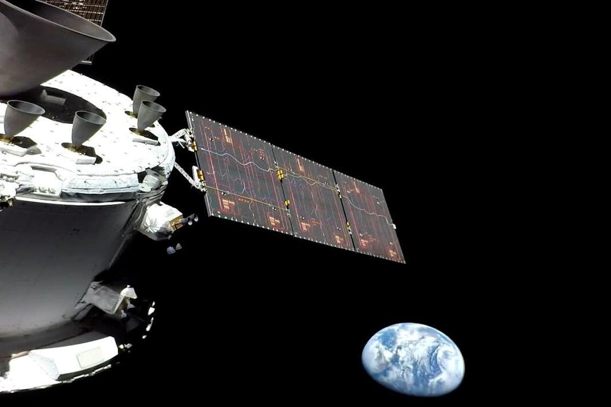The Orion spacecraft took this picture of Earth on Nov. 16, the first of a 25-day test flight of all key systems. WashU alum Fiona Turett, BSME ’09, was in the thick of it as a NASA flight director on the Artemis I mission. (Photo: NASA)