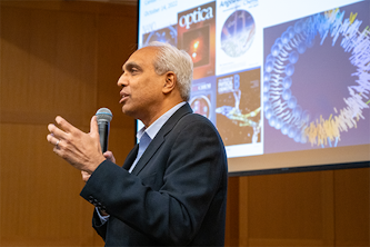 Rohit Pappu, director of the Center for Biomolecular Condensates, welcomed researchers from around the world to the day-long inaugural symposium Oct. 14 in Whitaker Atrium. (Sid Hastings)