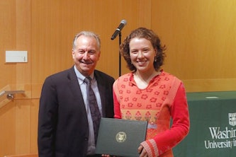 (From left) Dean Aaron Bobick awarded Emily Sheehan the Ralph S. Quatrano Prize in April.