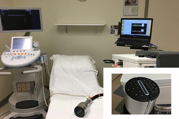 Zhu's lab developed this handheld ultrasound-guided diffuse optical tomography system which consists of a 10-centimeter probe and a near-infrared system that takes data noninvasively from the breast from nine sources and 14 detectors in less than 4 seconds.