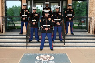 Eric Kruse, pictured in the third row on the left, credits his background in providing physical security with the U.S. Marines for preparing him for a career in cybersecurity.