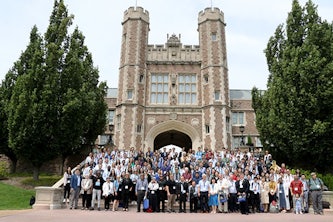 Conference attendees gathered outside of Brookings Hall at Washington University in St. Louis