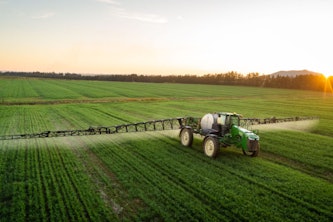 A farmer sprays pesticides on crops. New research from the lab of Kimberly Parker at the McKelvey School of Engineering shows that amines, sometimes used as an additive in herbicides, can enter the atmosphere, where they pose risks for human health and alter the atmosphere. (Photo: Shutterstock)