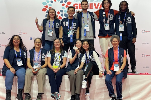 Yifei "Bruce" Li (back row, second from right) said he enjoyed the creative and inclusive spirit of the FIRST Global Challenge so much that he decided to return as a volunteer.