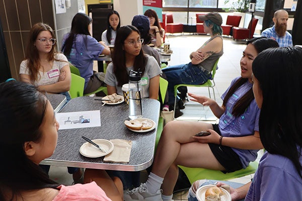 The event included a mentorship breakfast during which students, faculty and alumni shared their experiences in computer science with first-year students. 
