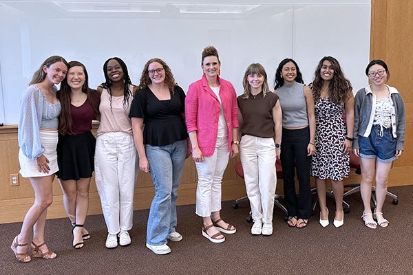 Melissa Holtmeyer Terlaje, center, is a three-time graduate of WashU who mentored junior and senior students during the center’s first topic-mentoring session in May. The expanded mentoring program will include more frequent small-group mentoring sessions. 